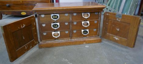 A late 19th century American Amberg patent mahogany index drawer cabinet