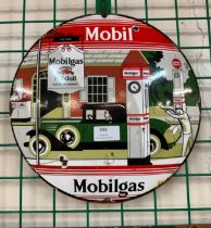 An enamelled Mobil Gas sign