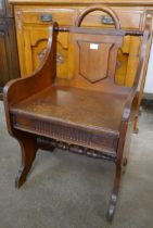 A Victorian Aesthetic Movement oak hall chair