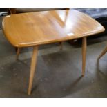 An Ercol Blonde elm and beech rectangular coffee table