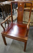 A Chinese hardwood elbow chair