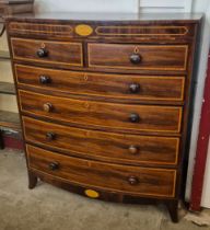 A George III inlaid mahogany bow front chest of drawers