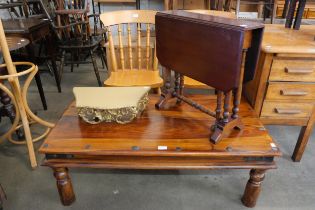 An Edward VII walnut Sutherland table, a Thakat hardwood coffee table, a pair of beech kitchen