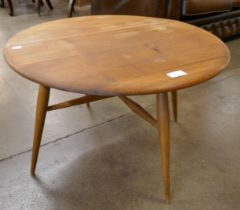 An Ercol elm and beech drop-leaf coffee table