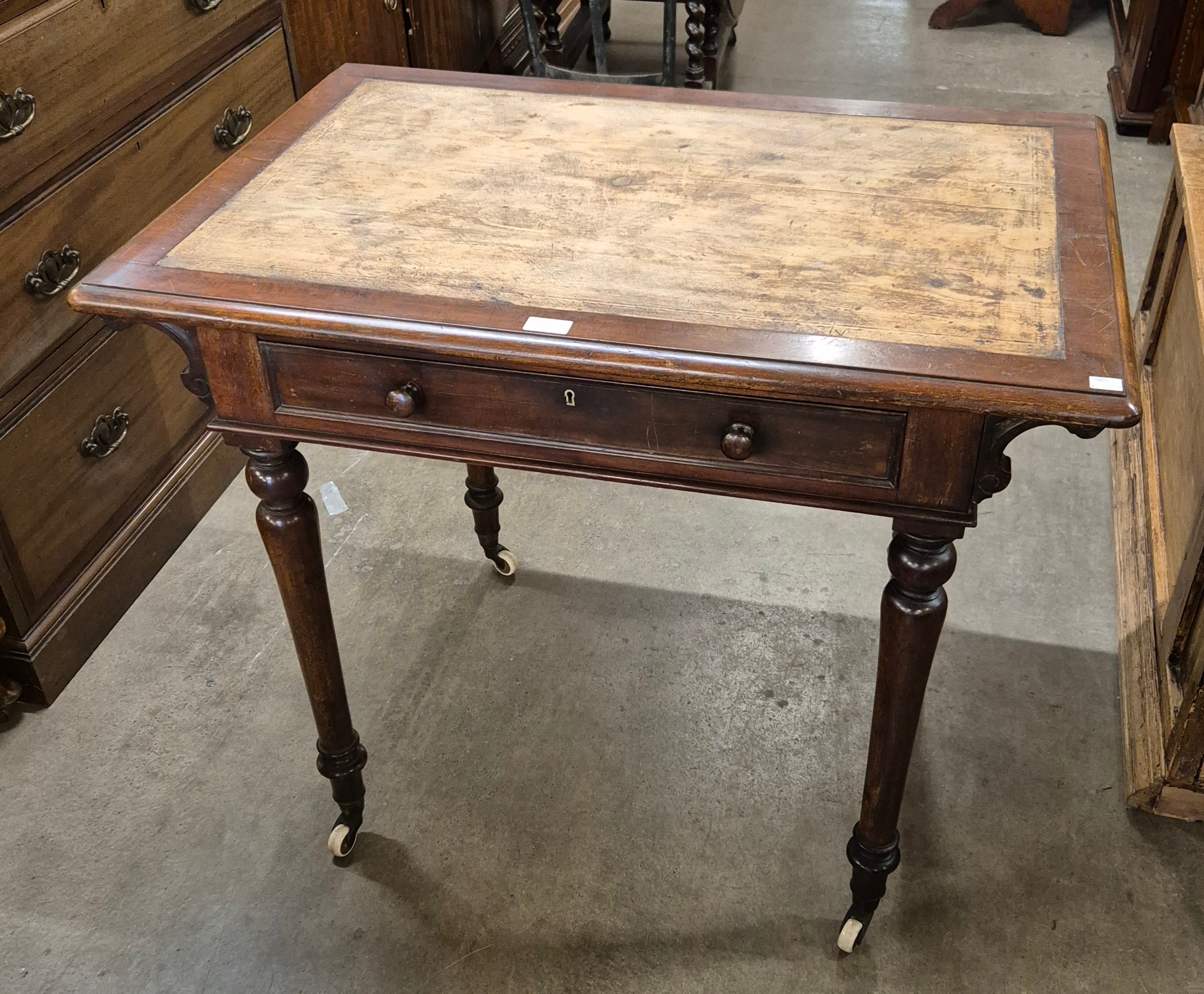 A Victorian Heal & Son, London mahogany single drawer writing table