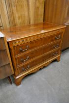 A George I style inlaid burr yew bachelor's chest of drawers