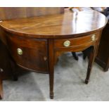 A George III style mahogany demi lune sideboard