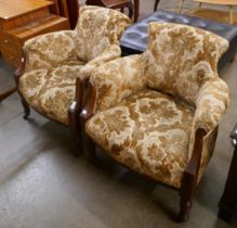 A pair of Victorian mahogany and fabric upholstered tub chairs