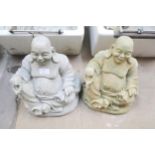 A pair of concrete garden figures of seated Buddhas