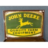 A John Deere tin sign