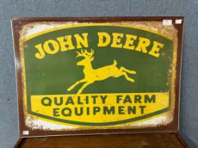A John Deere tin sign