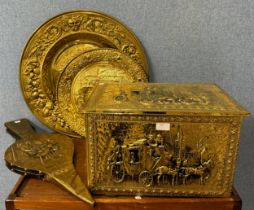A brass mounted coal box, bellows and two brass chargers