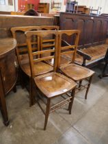 A set of four early 20th Century beech chairs