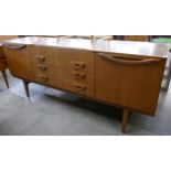 A Beautility teak sideboard