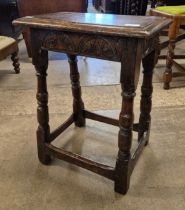 An 17th Century carved oak joint stool