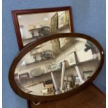 Two oak oval framed mirrors and one other