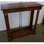 A Regency rosewood and gilt metal mounted console table