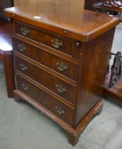 A George III style walnut bachelor's chest of drawers