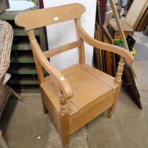 A Victorian pine commode chair
