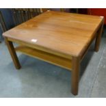 A square teak coffee table