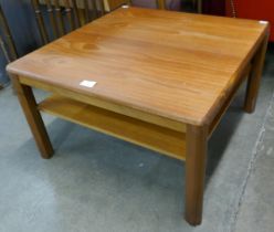 A square teak coffee table
