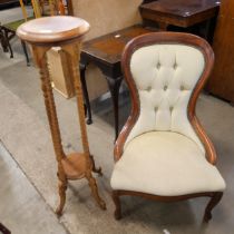 A Victorian style beech and fabric upholstered lady's chair and a torchere