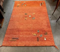 An orange ground rug