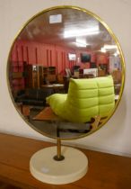 A Perspex and brass dressing table mirror