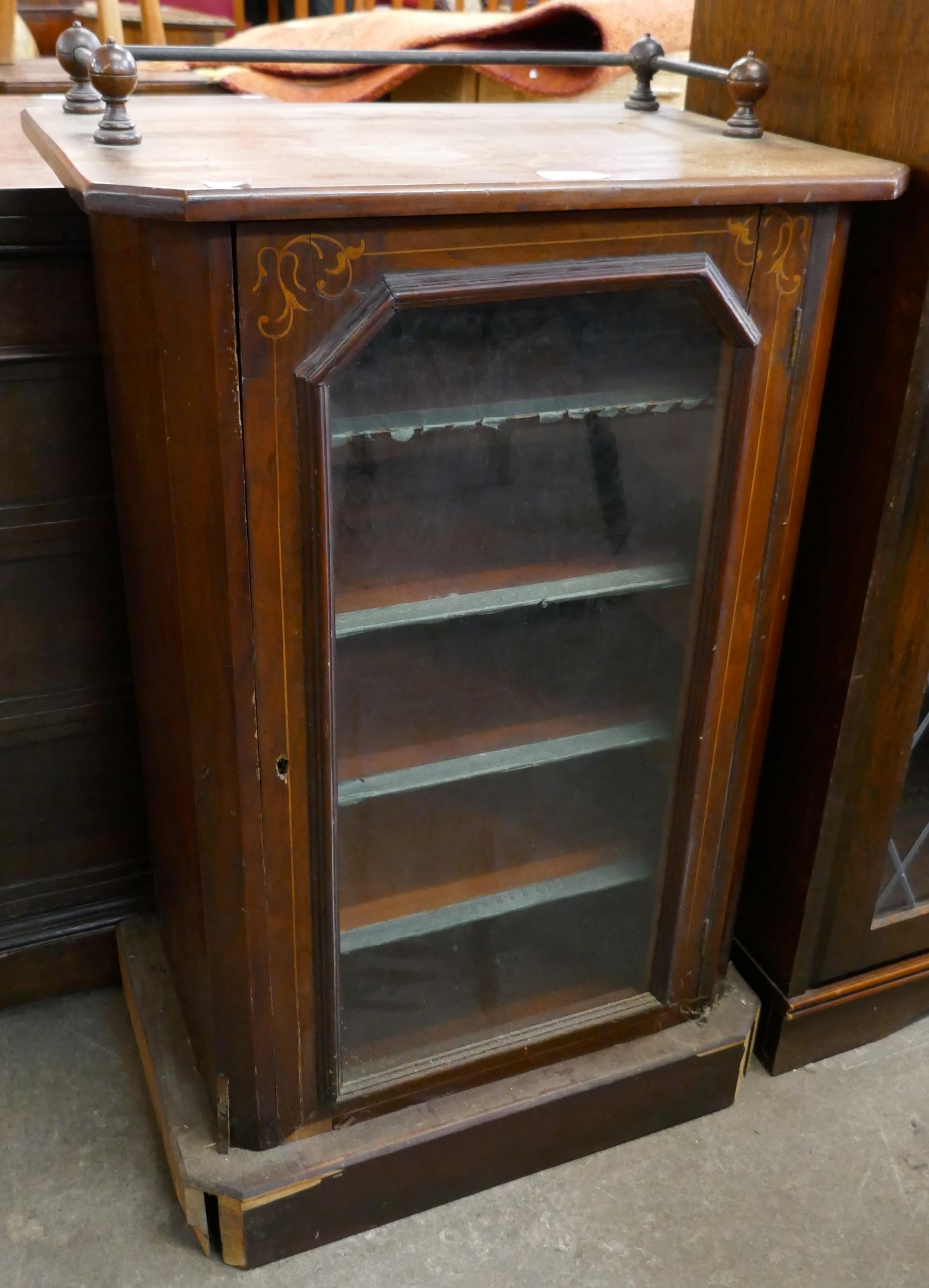 A Victorian inlaid walnut music cabinet