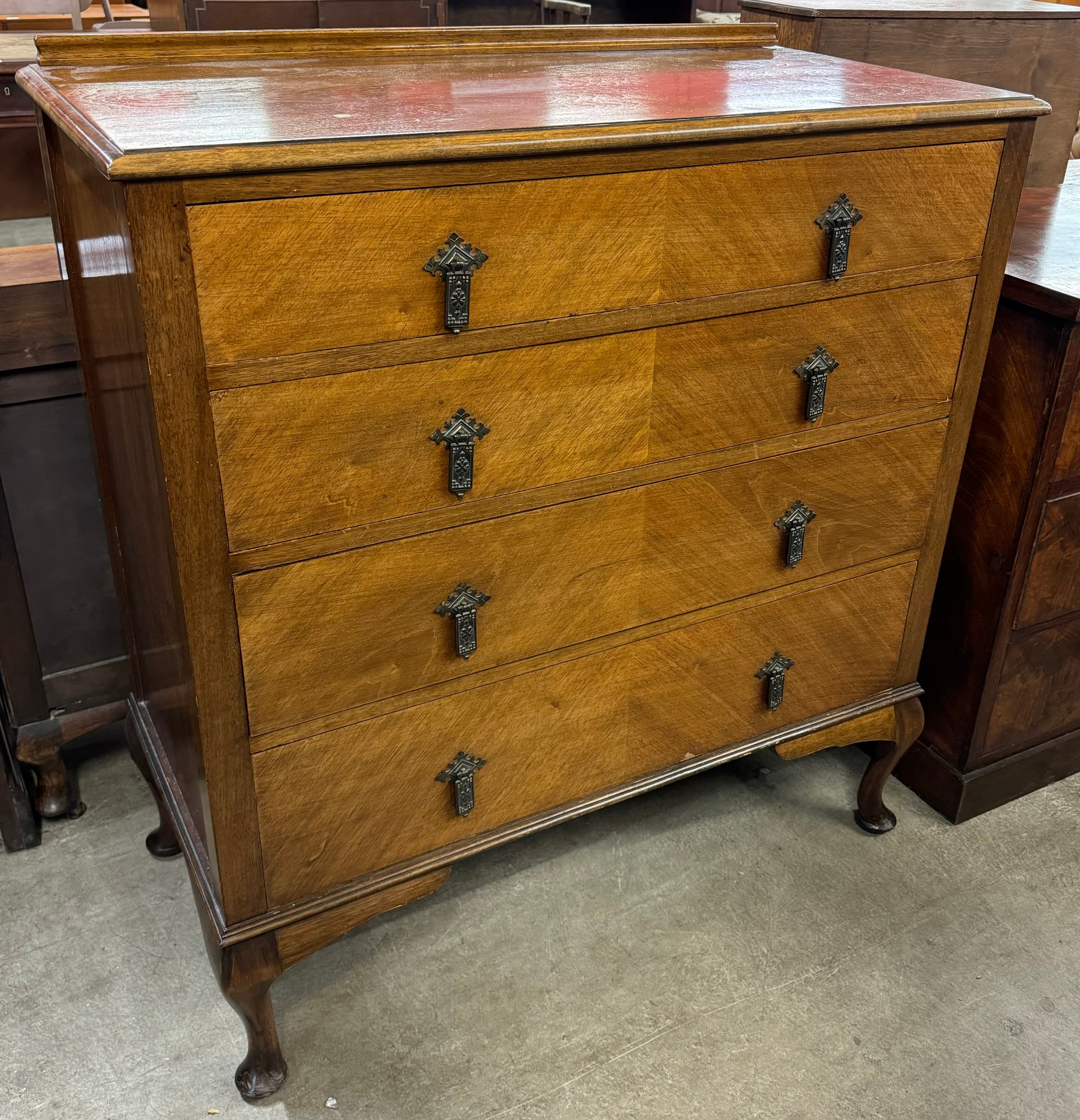 Two Edward VII walnut chests of drawers