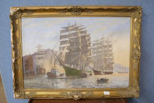 Philip Kilner (fl.1920-1940), galleons in a harbour, oil on canvas, framed
