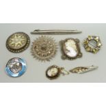 A silver Arthur Johnson Smith lily of the valley brooch, a silver brooch set with citrines, an