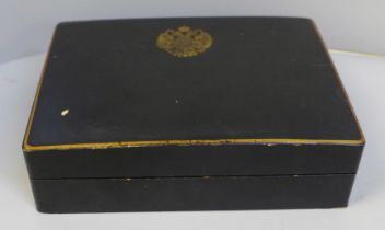 A lacquered wooden box with Imperial Russian emblem on lid, a/f
