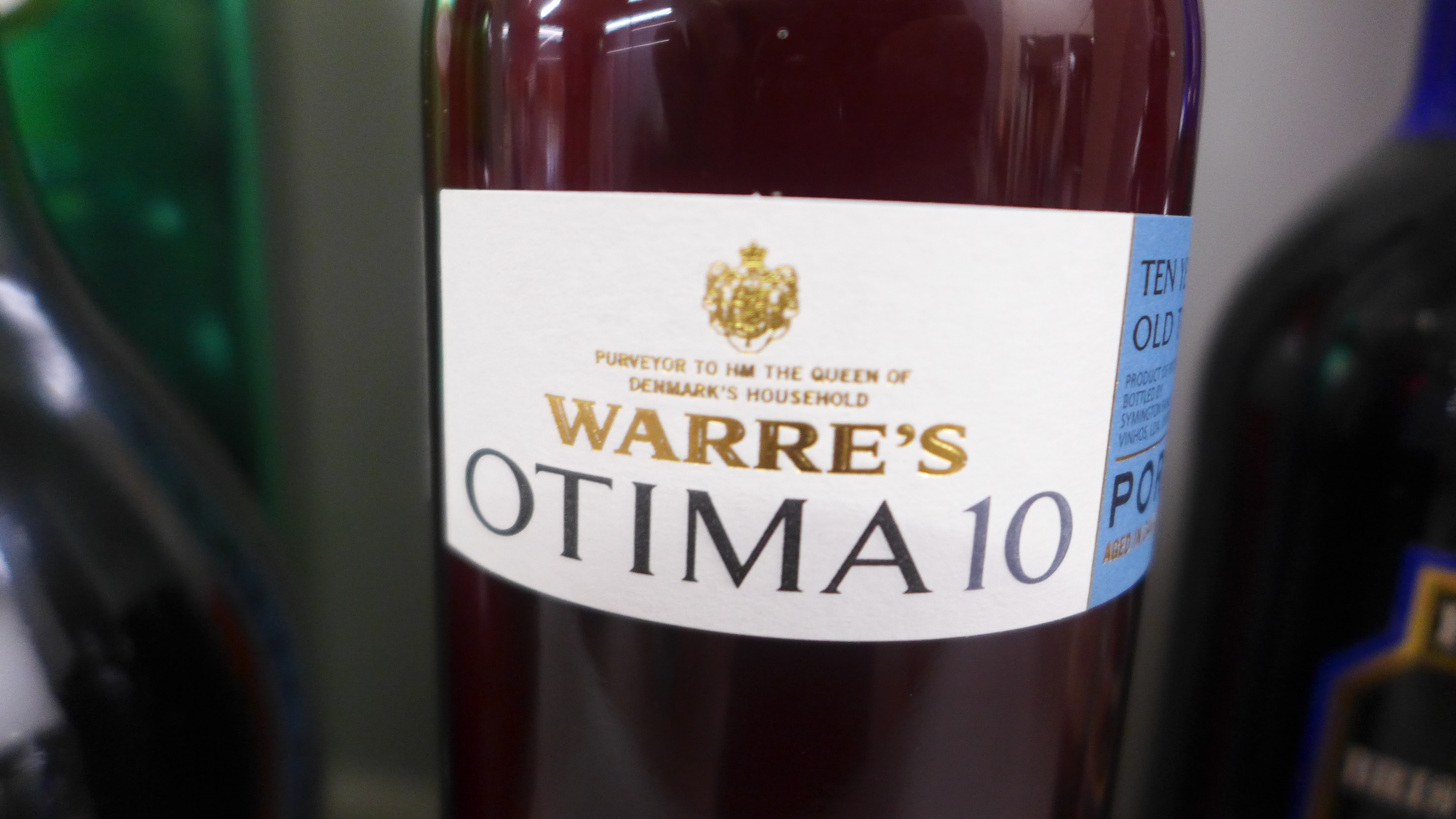 A bottle of Harveys Bristol Cream, two bottles of Port, Ten Year Old Tawny and Ten Year Warre's - Image 3 of 5