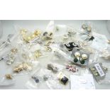 Sixty pairs of clip on earrings