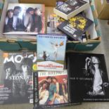 A box of Rolling Stones books and DVDs and a 'Get Yer Ya-Ya's Out' CD and DVD box set