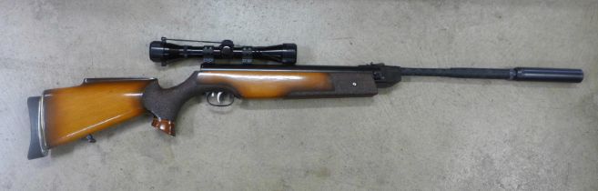 A Weihrauch HW80 4.5 .177 calibre air rifle, with scope and silencer