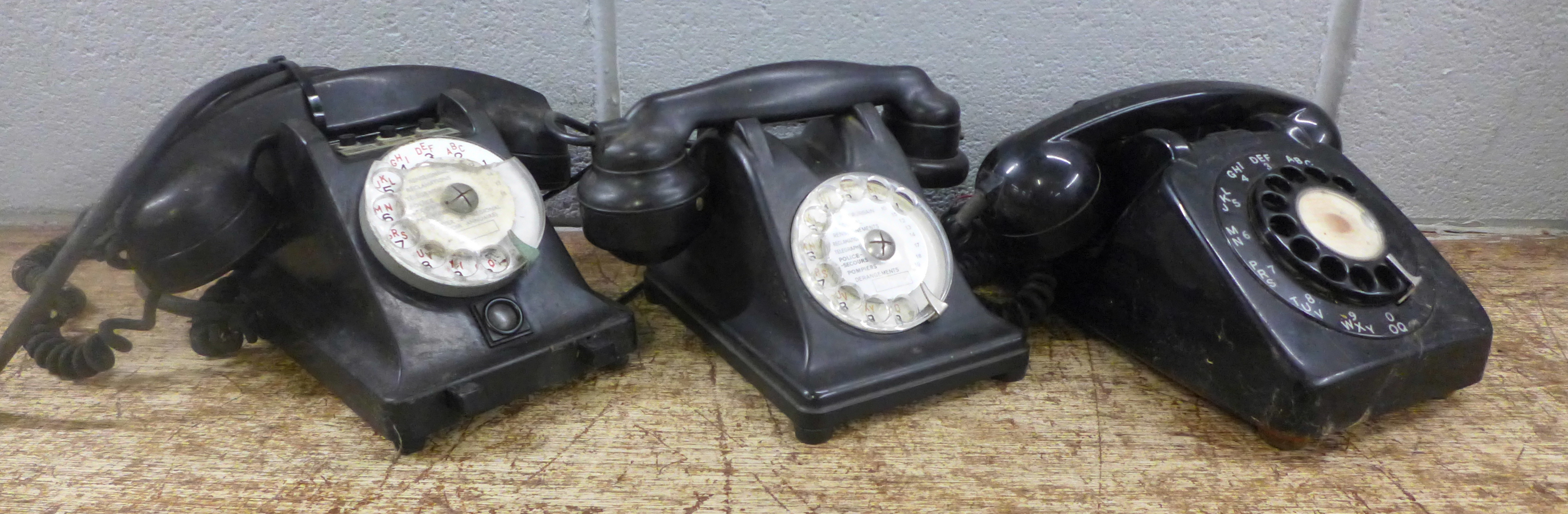 Three Bakelite telephones including a French example