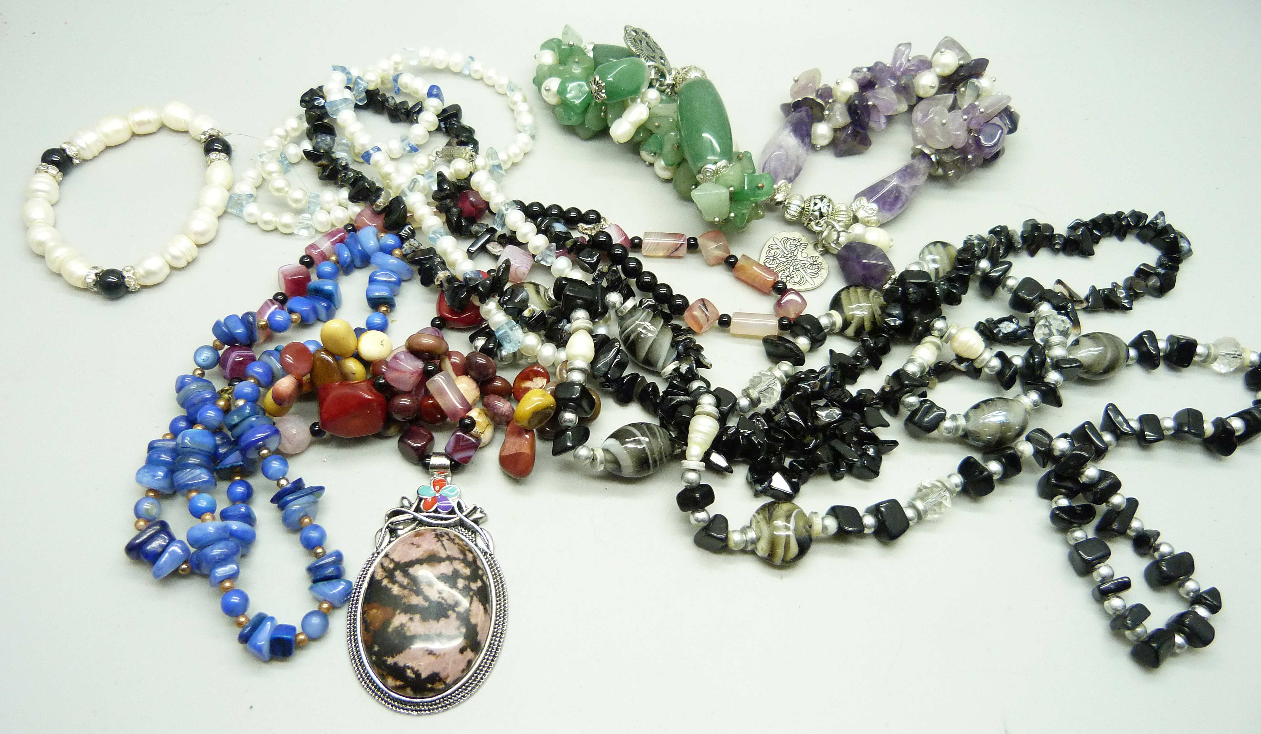 Four gemstone bracelets and five necklaces