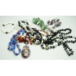 Four gemstone bracelets and five necklaces