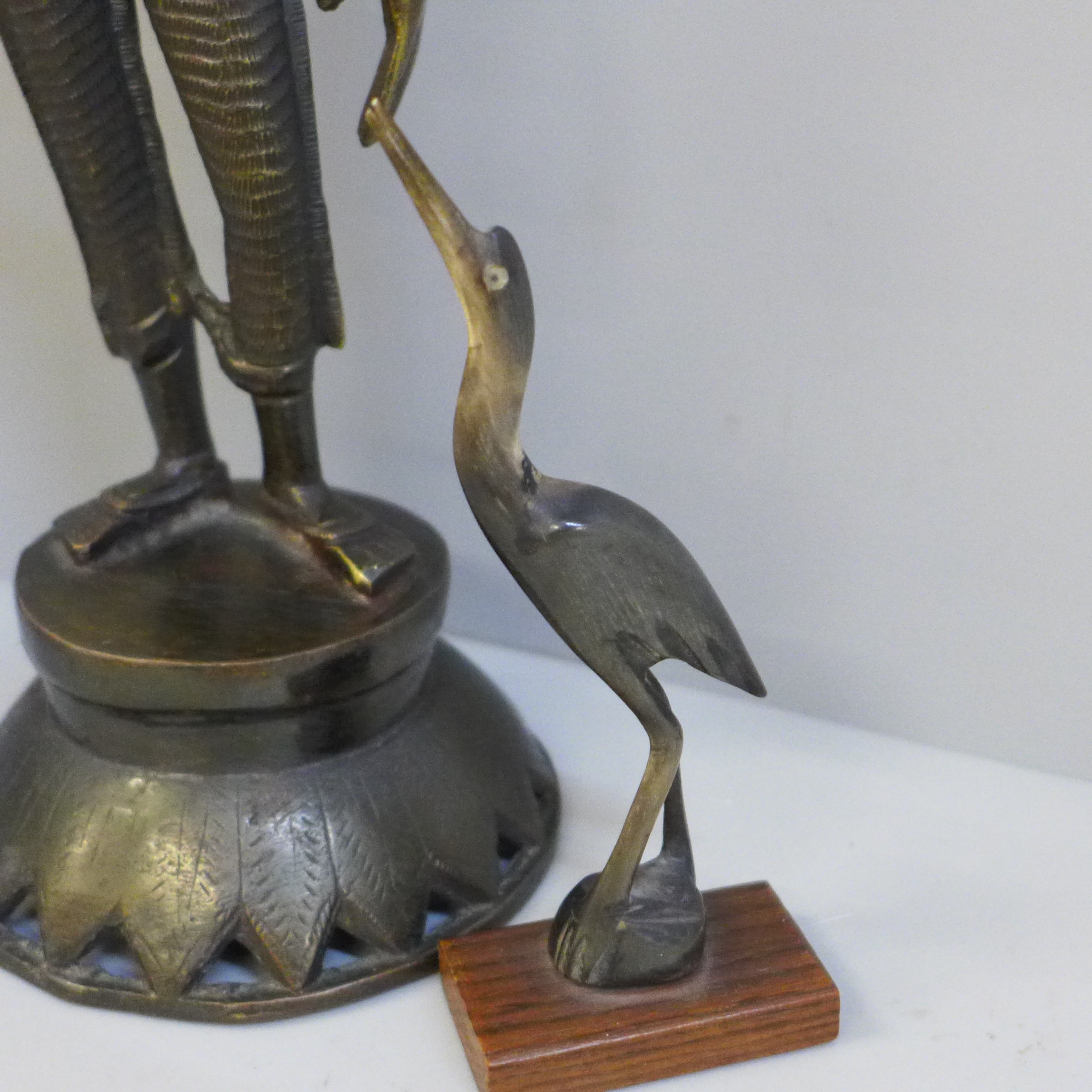 A bronze model of an Indian Goddess, Parvati Devi and a horn and rosewood model of a bird - Image 2 of 4