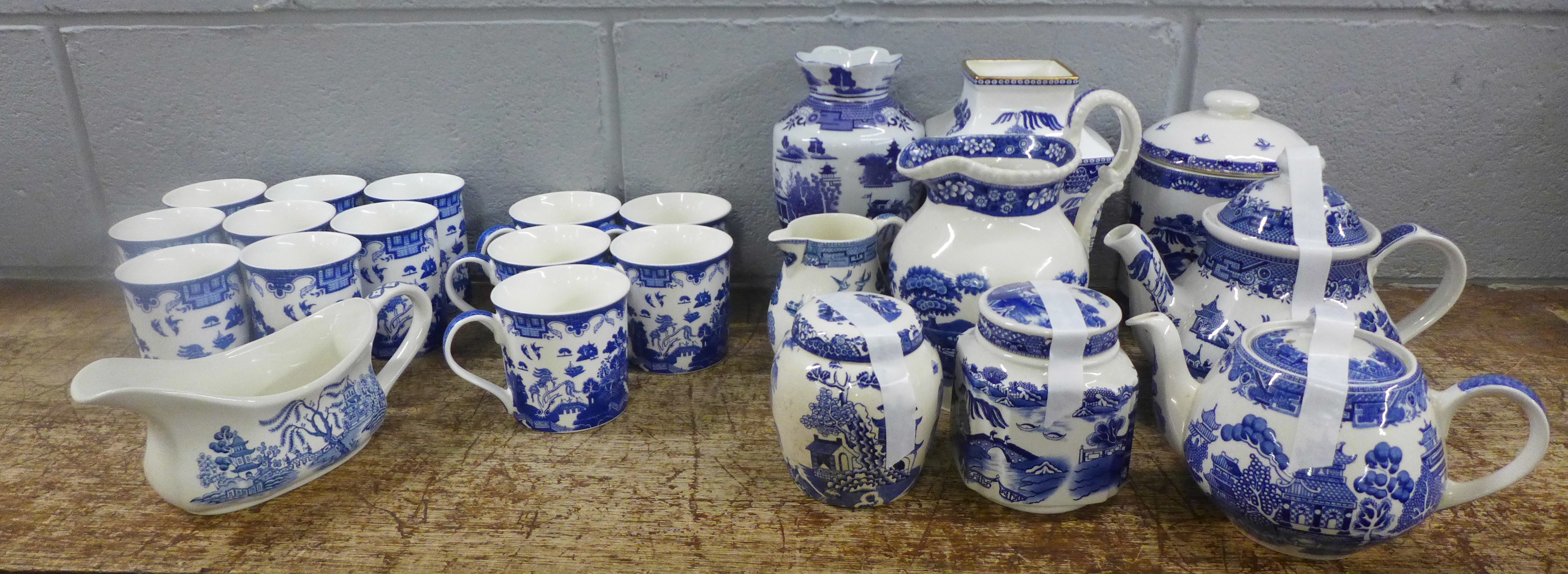 Thirteen Leonardo Collection blue and white mugs, other blue and white vases, jugs, teapot, etc.,