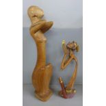 Two Eastern carvings, tallest 57cm, both a/f