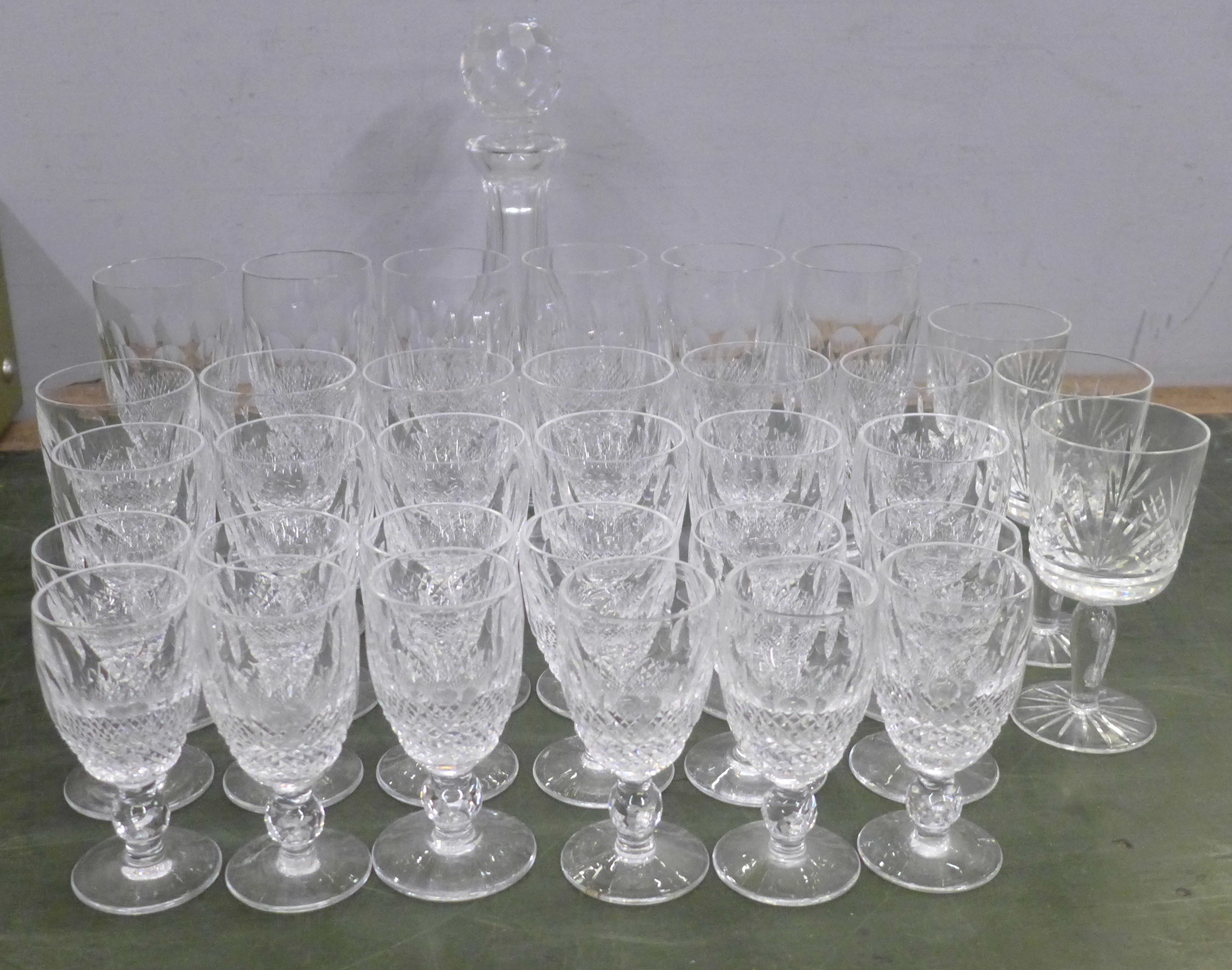 A set of Waterford Crystal drinking glasses; six champagne glasses, six wine glasses, six sherry