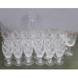 A set of Waterford Crystal drinking glasses; six champagne glasses, six wine glasses, six sherry