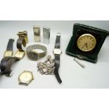 An 8 day travel clock, wristwatches, lighters and a Masonic medal, inscribed 'Presented to the lodge