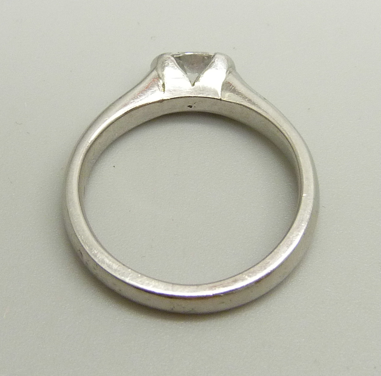 A platinum and diamond solitaire ring, approximately 0.5ct diamond weight, 6.7g, M - Image 4 of 4