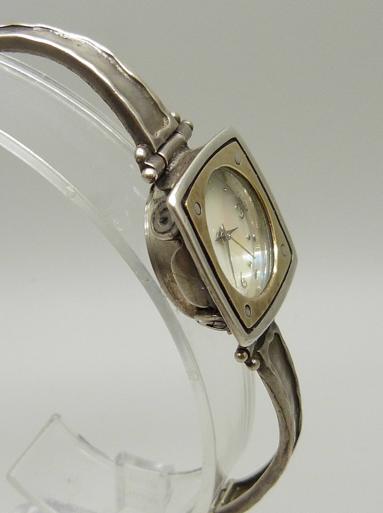 A lady's silver wristwatch with hammered design bezel and strap, hallmarked on the clasp with - Image 3 of 4