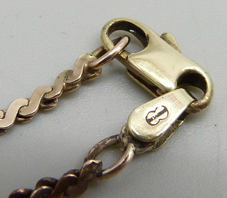 A yellow metal necklace, the chain rose gold with a yellow gold replacement clasp marked 14k, 64. - Image 2 of 2