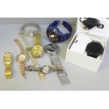 Lady's and gentleman's wristwatches including one with silver bangle strap and a boxed Smart watch